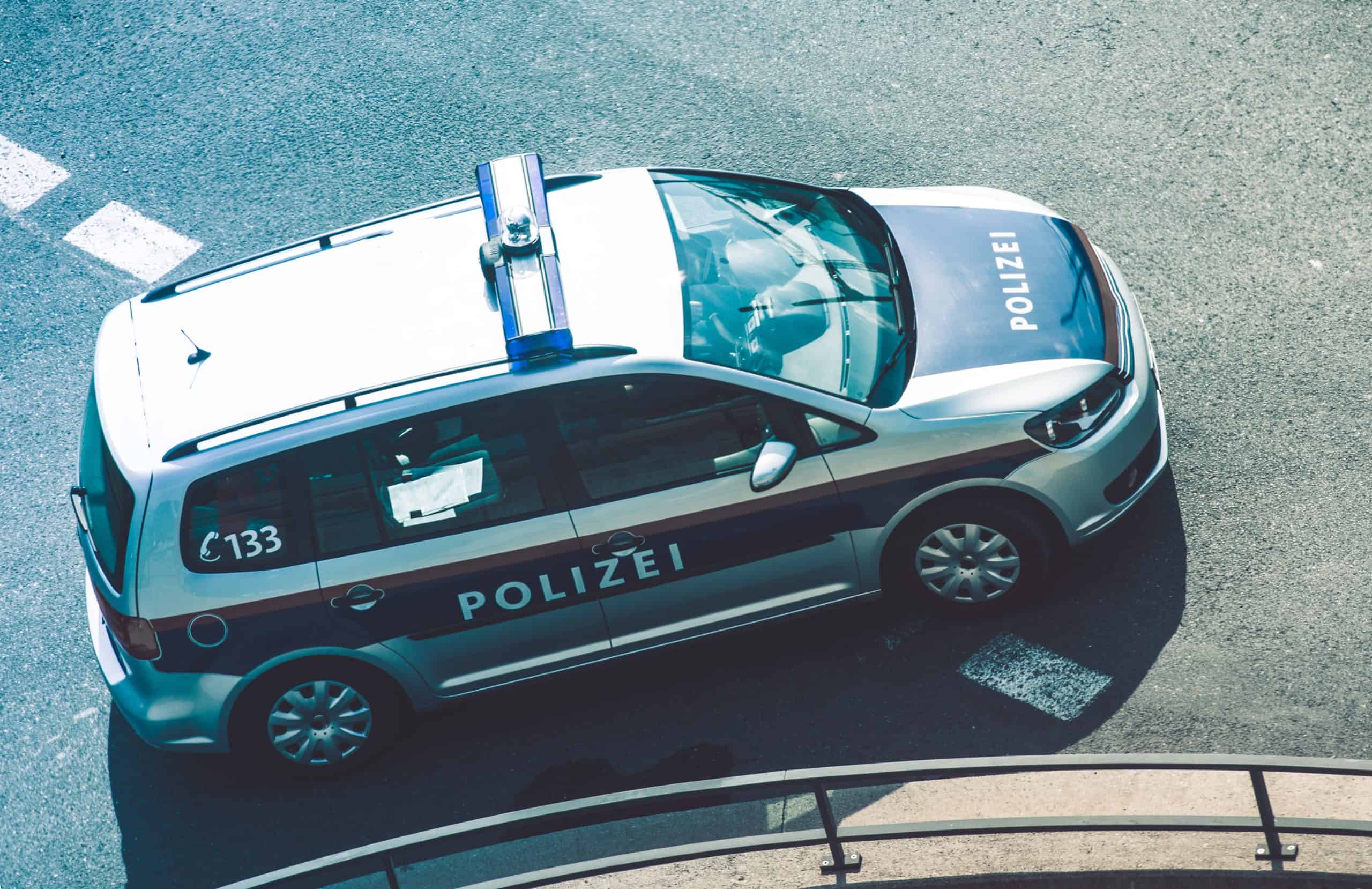 Federal Police Cruiser in Austria. Bird Eye View. Police Vehicle on the City Street. Polizei.